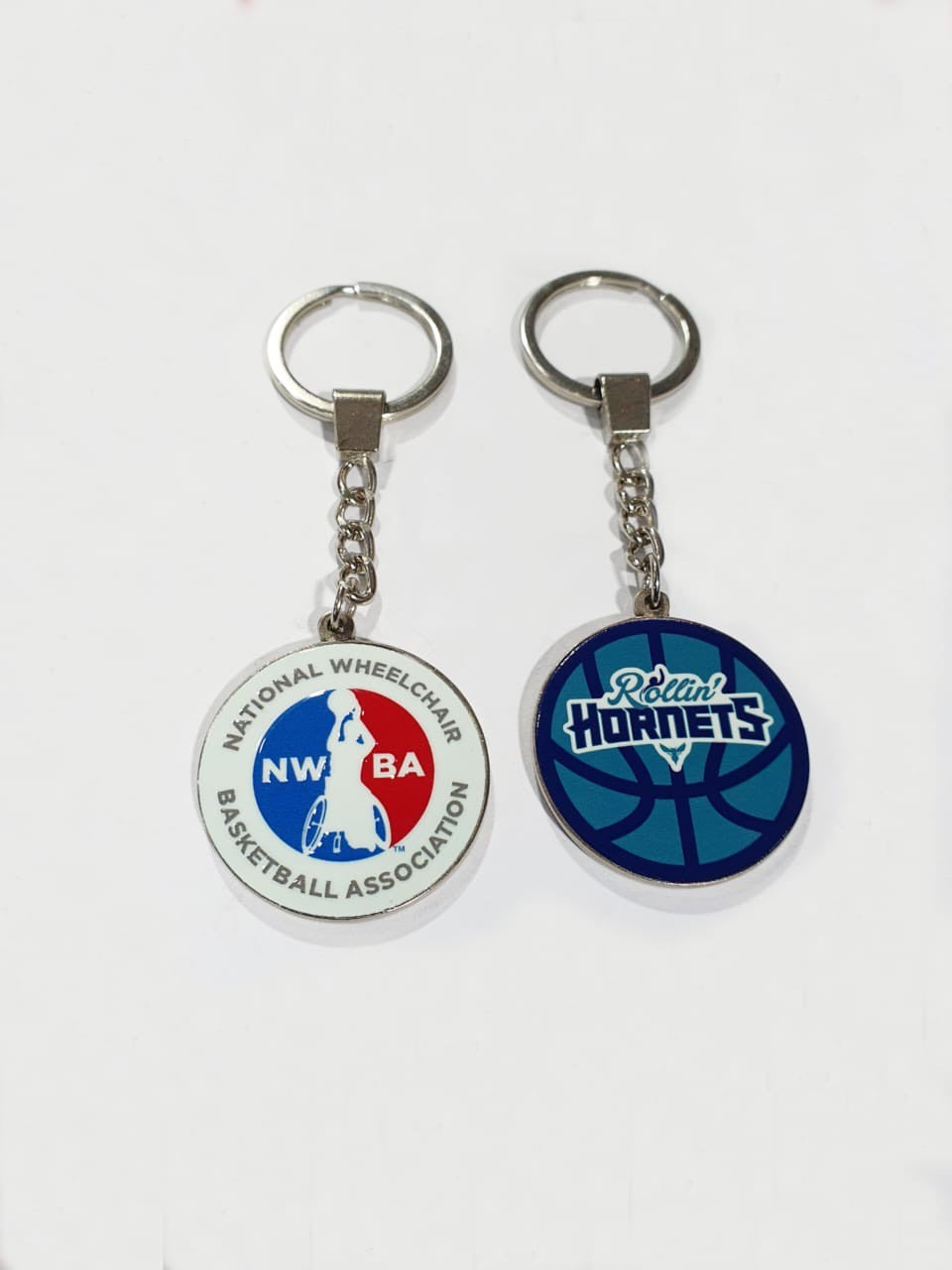 NWBA Officially Licensed - Rollin' Hornets - Double sided 1.5 Inch Enamel Keychain
